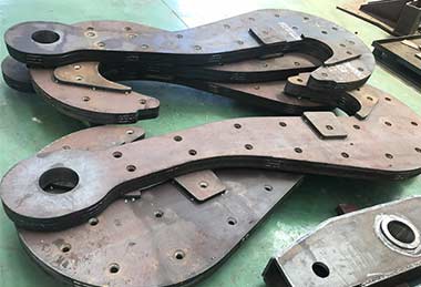 Laminated ladle hook for ladle handling 