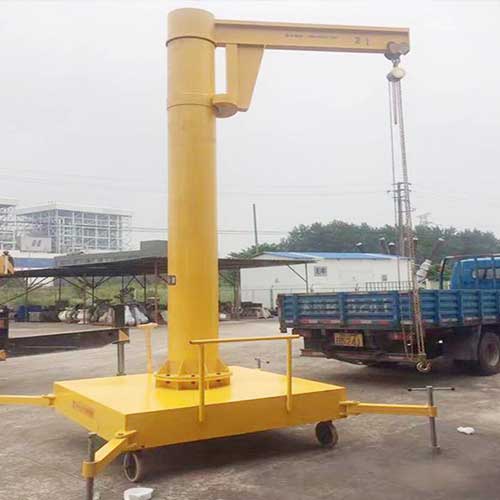 Small portable jib crane on wheels for indoor and outdoor use 
