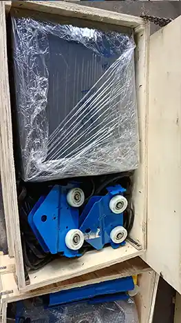 Electric hoist packed into wooden case 