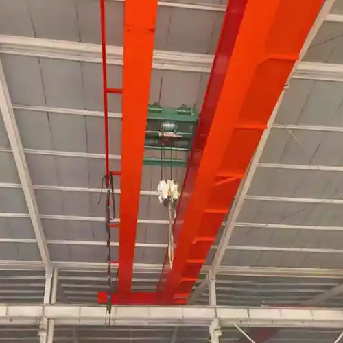 Low profile and low headroom hoist crane with integrated hoist trolley 