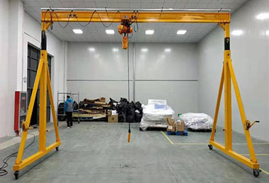 Portable gantry crane with electric chain hoist  Portable gantry crane with electric chain hoist