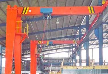 Gantry crane with vacuum lifter for glass handling