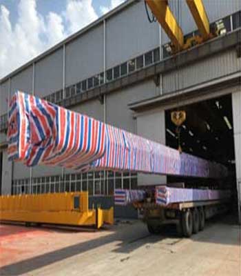 Factory loading of 32 m length beam of gantry crane