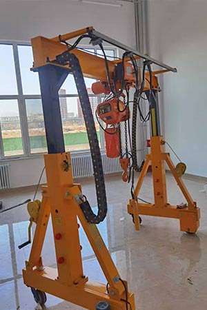 Telescopic gantry crane with height motorized telescopic gantry design