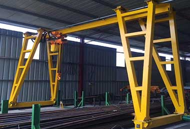 Rail mounted small gantry with electric hoist 