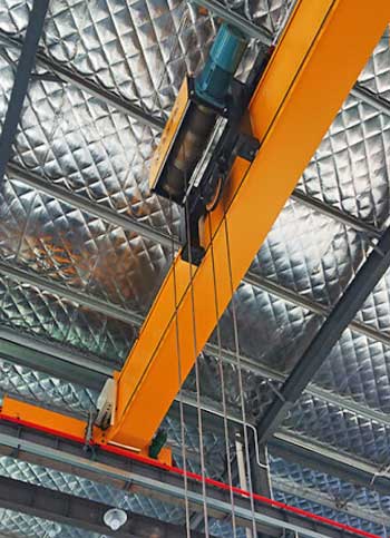 Low headroom overhead crane for low headroom and space constraint