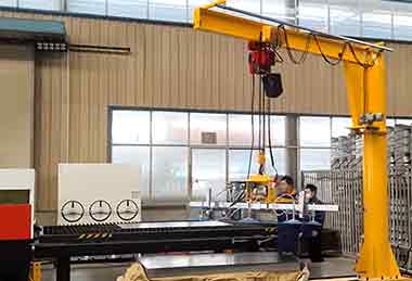 Slewing jib crane processed for steel plate handling -