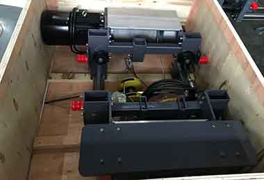 Electric wire rope hoist packed in wooden cases for delivery to Australia