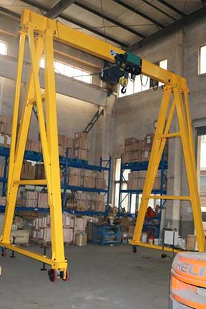 Portable gantry crane with European style low headroom hoist Portable gantry crane with European style low headroom hoist