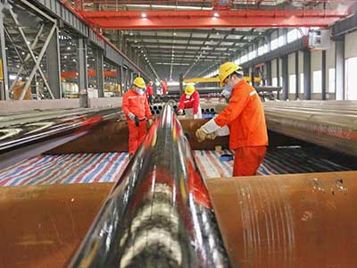 Overhead crane for indoor workshop or warehouse steel pipe handling Overhead crane for indoor workshop or warehouse steel pipe handling
