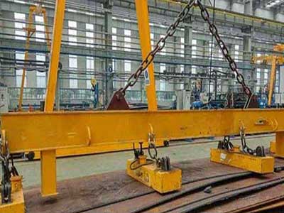 Overhead cranes with electromagnet beam spreader for horizontal plate handling