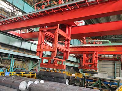 Steel round billets handling bridge crane with magnetic lifter Steel round billets handling bridge crane with magnetic lifter