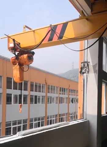 Telescoping cantilever bridge under running overhead crane for high building use for material handling