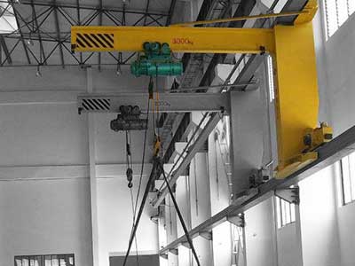 Electric wall travelling jib cranes on rails 