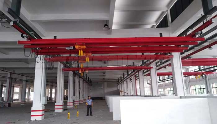 Ceiling mounted single girder kbk cranes, combined for efficient material handling