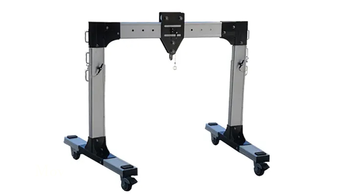 Portable aluminum gantry crane with telescoping T frame gantry and adjustable crane sapn design