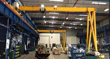 Modular gantry crane with half gantry design