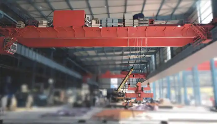 overhead crane with rotary magnetic beam spreader