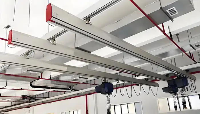 Light duty ceiling mounted workstation crane